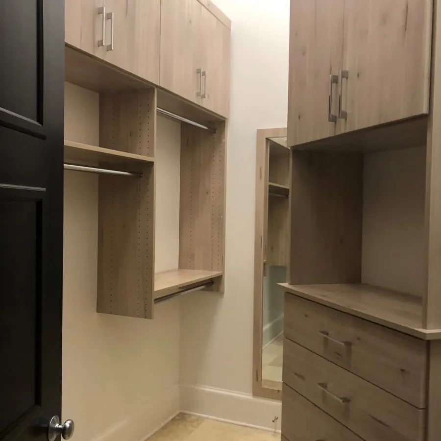 a room with wooden cabinets