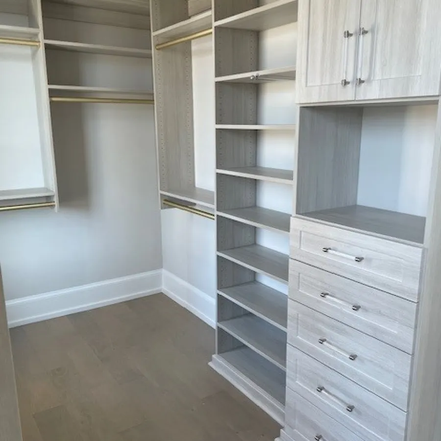 a room with white cabinets