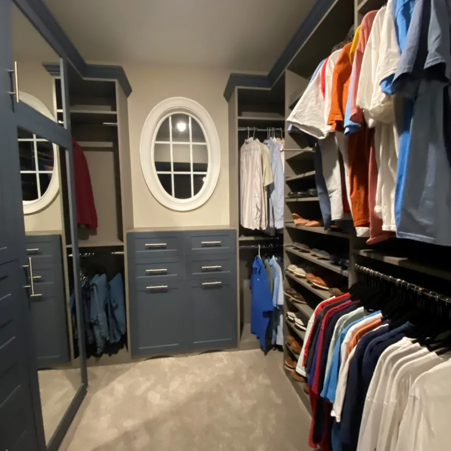 a closet with clothes