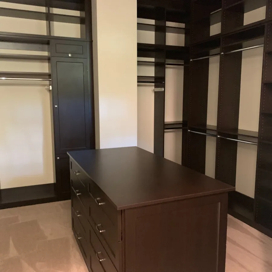 a room with black cabinets