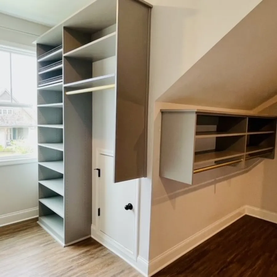 a white cabinet with a glass door