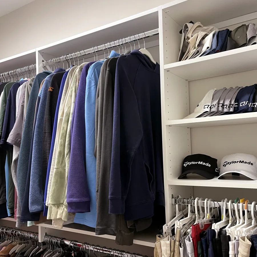 a closet full of hats and shirts