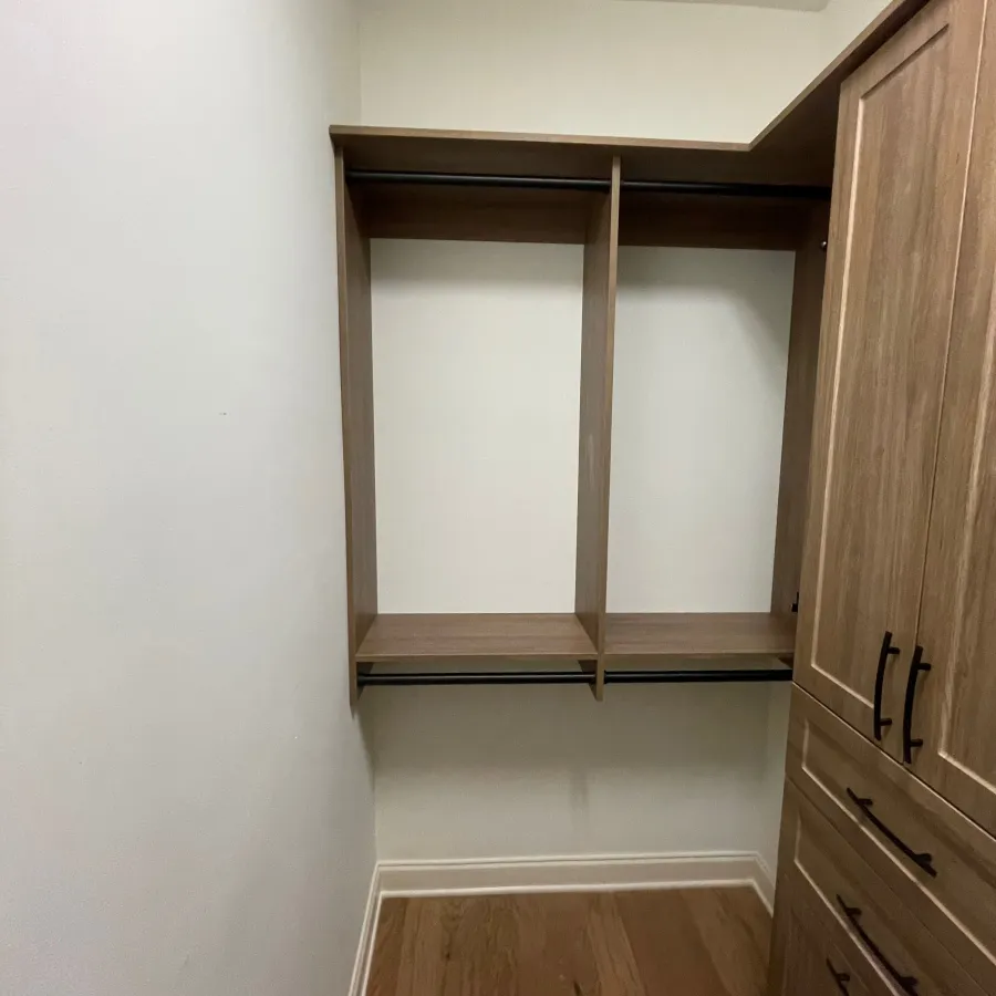 a room with a cabinet and a door