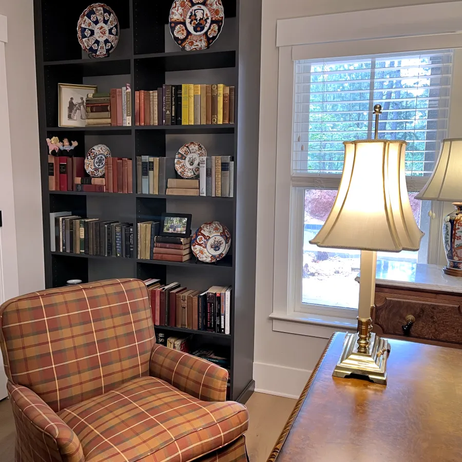 a living room with a bookcase