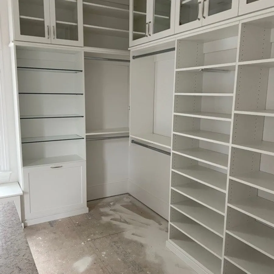 a room with white cabinets