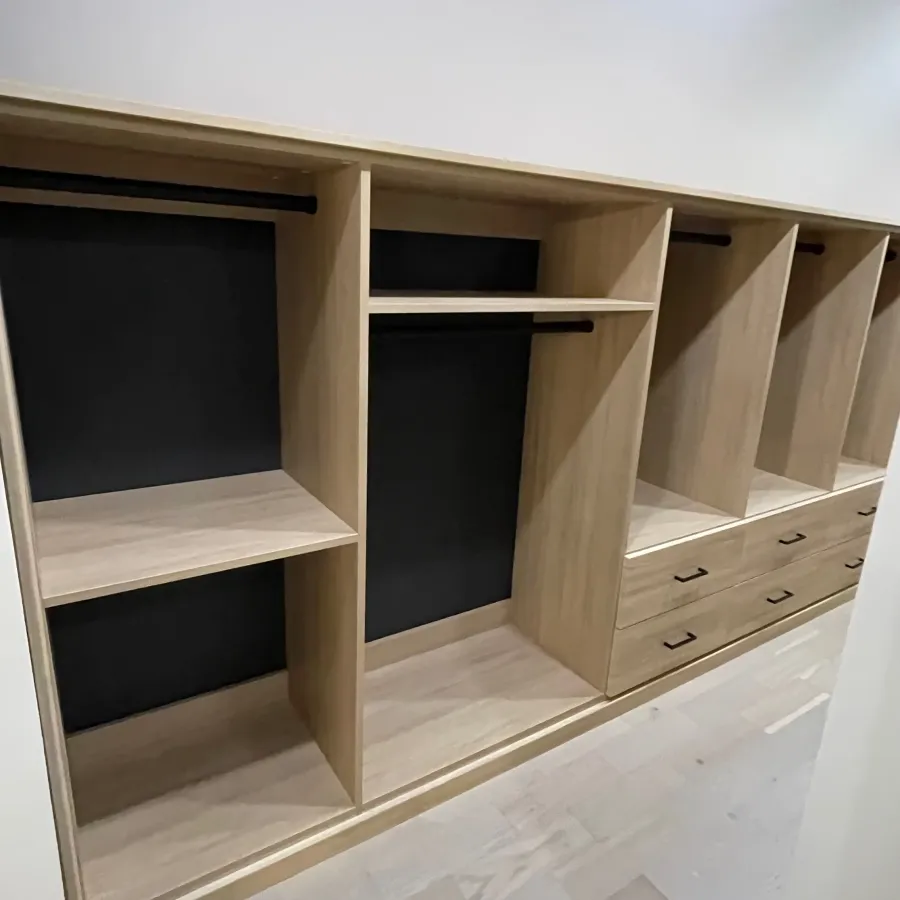 a wooden shelf in a room