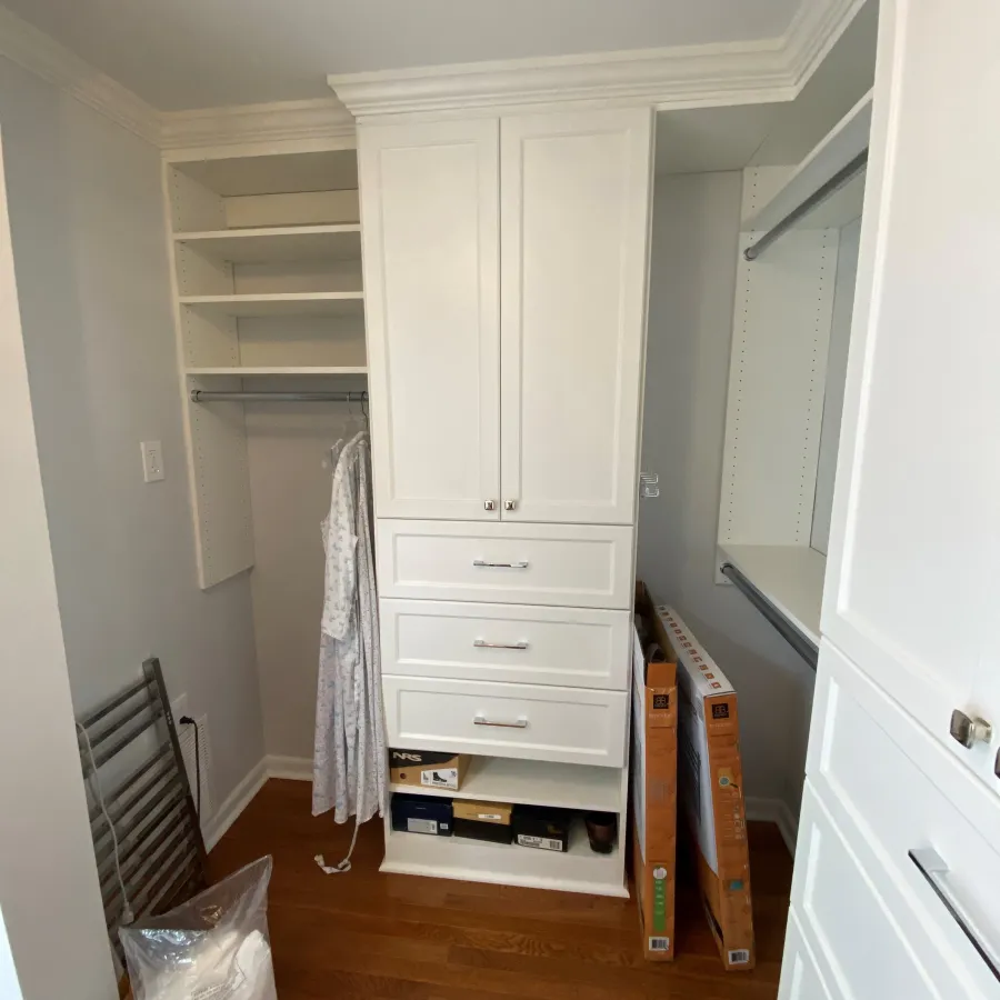 a room with white cabinets