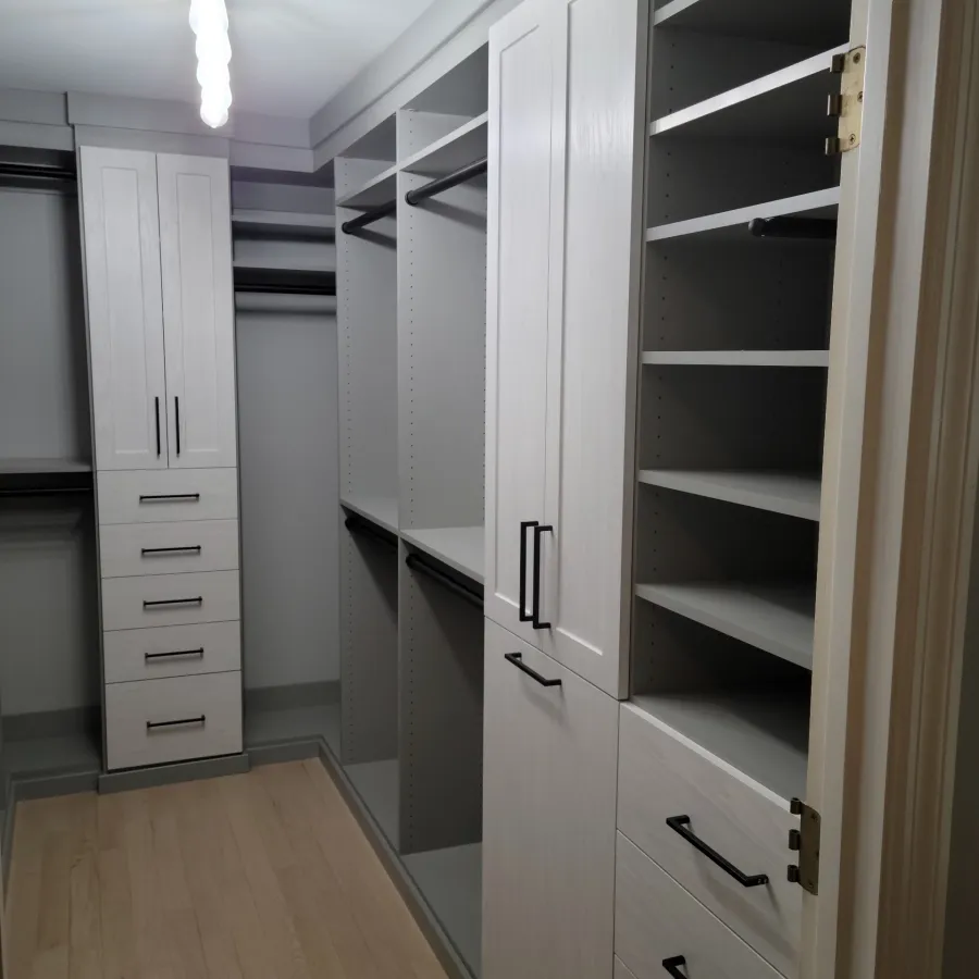 a room with white cabinets