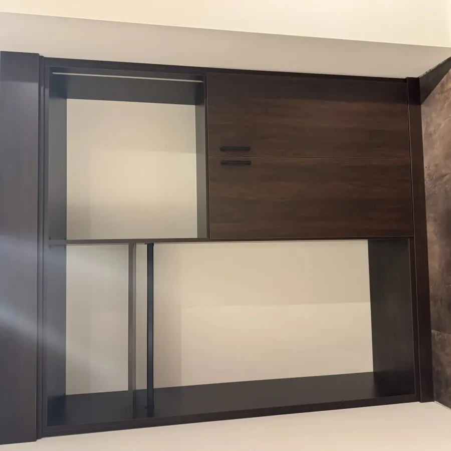 Empty modern wooden closet with open shelves and sliding doors in a room with tiled floor