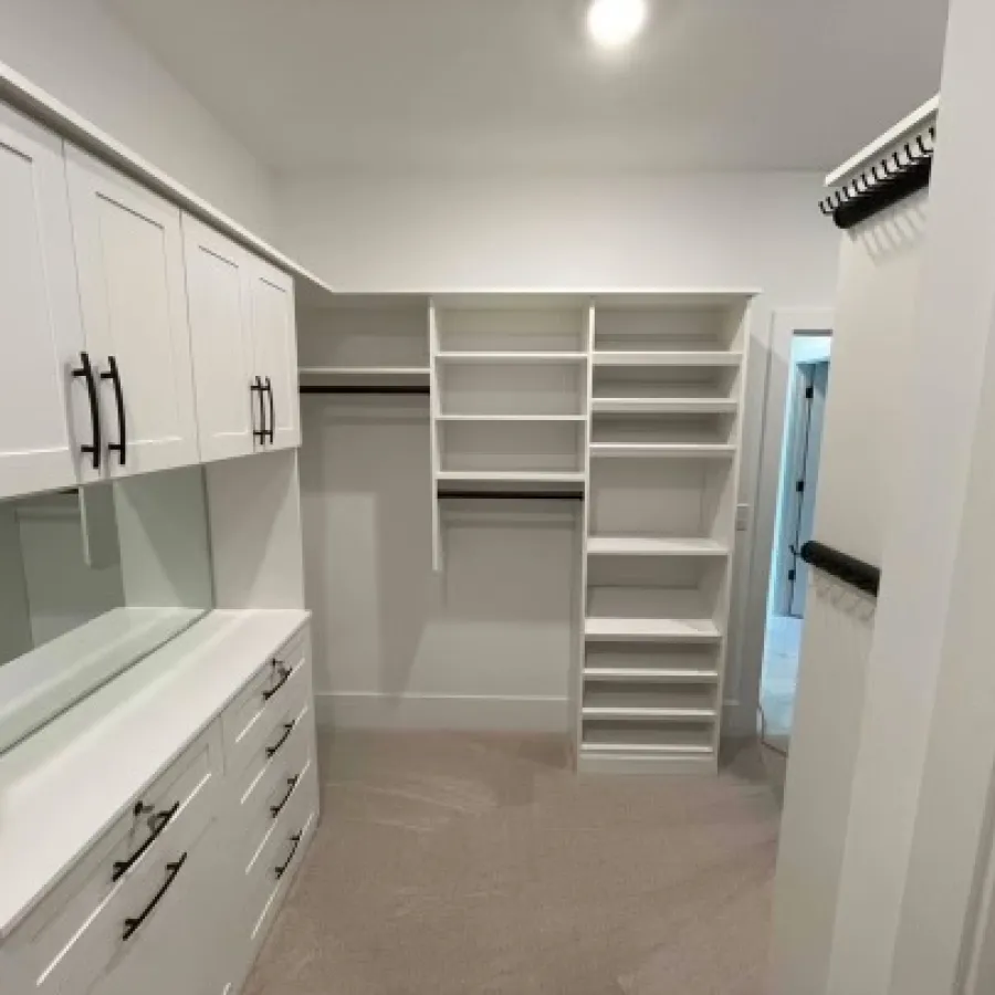 a room with white cabinets