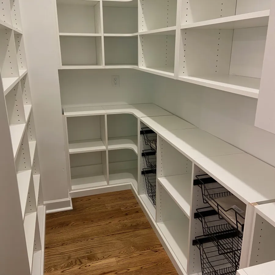 a room with shelves and a wood floor