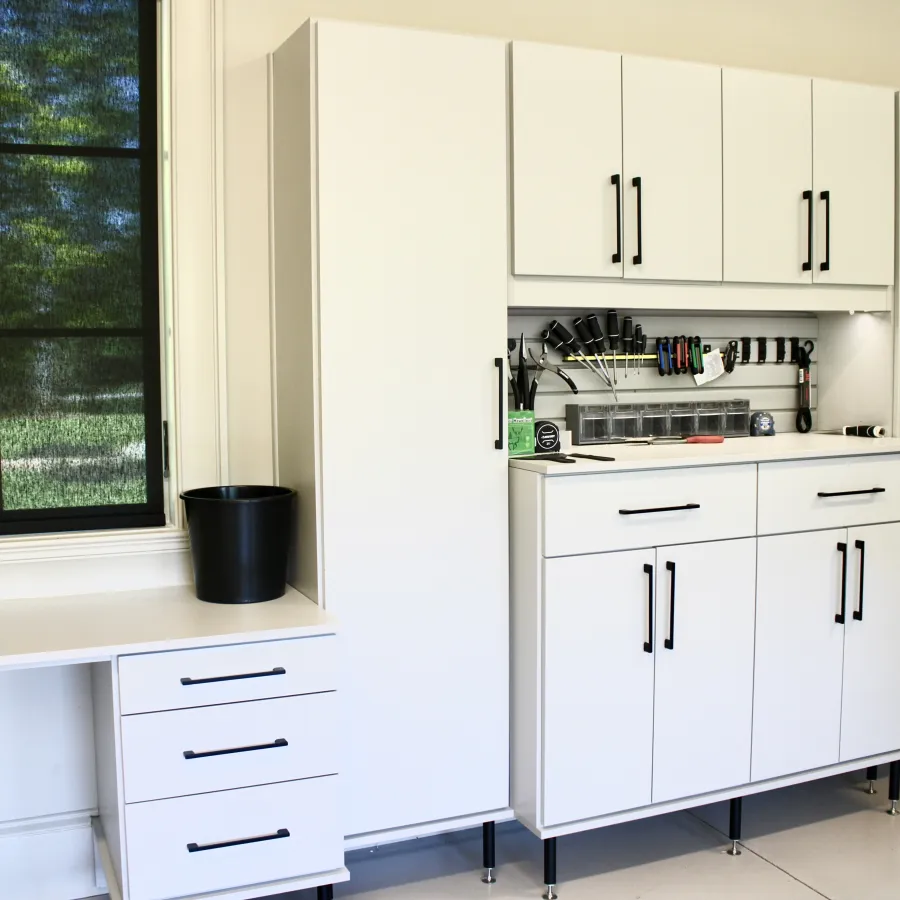 a kitchen with white cabinets