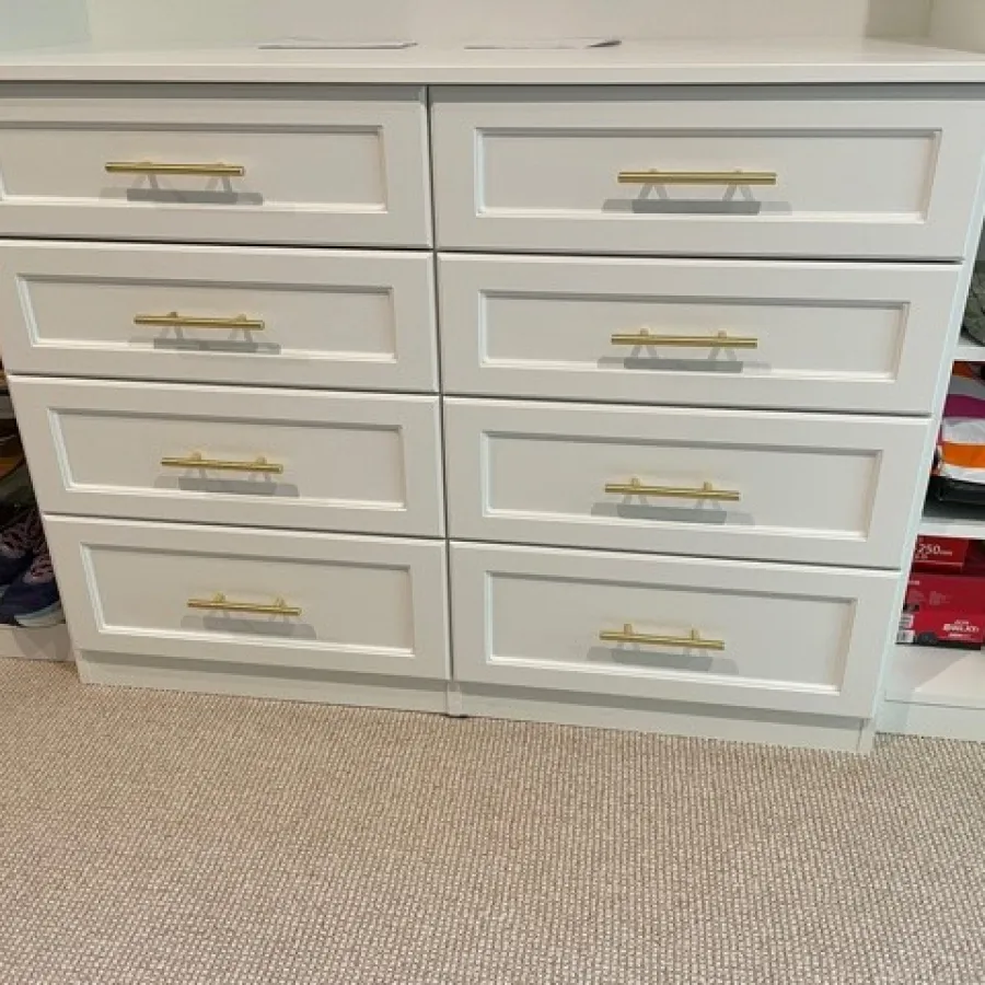 a white dresser with drawers