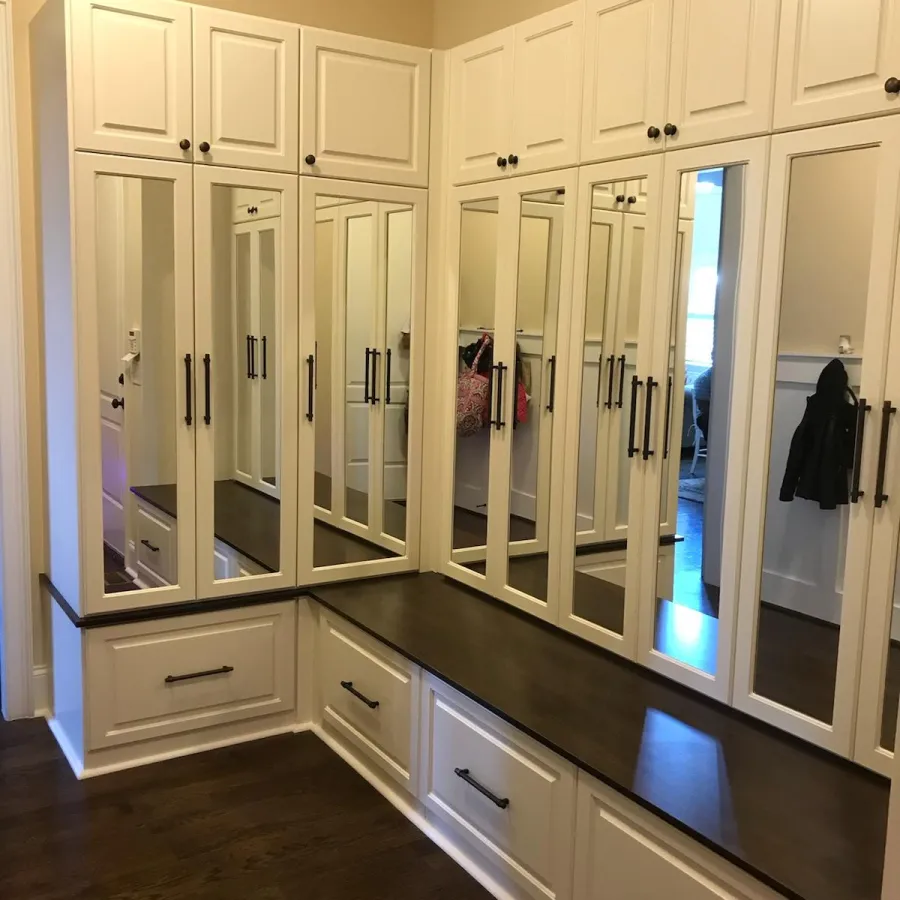 a kitchen with white cabinets