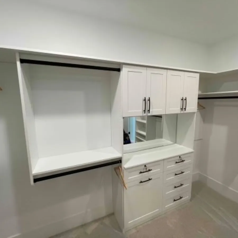 a white kitchen with white cabinets