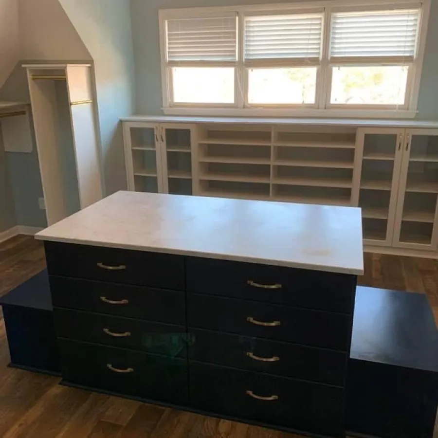 a kitchen with a counter top and cabinets