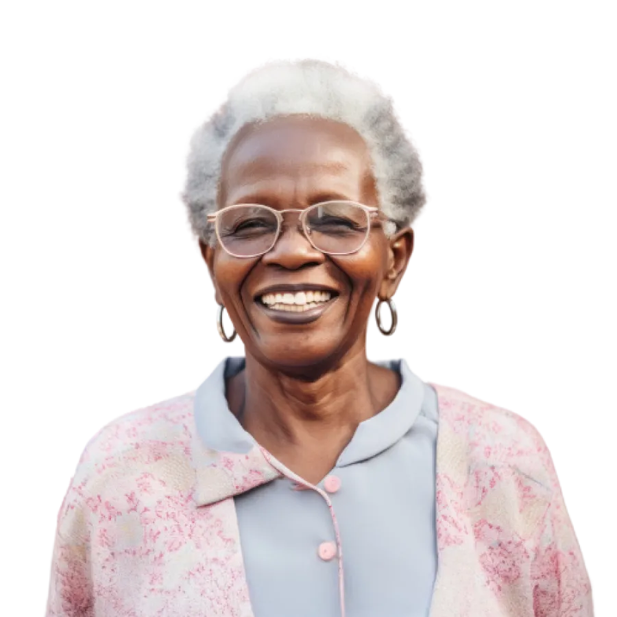 Smiling elderly woman with gray hair wearing glasses and a pastel cardigan, showcasing warmth and joy.