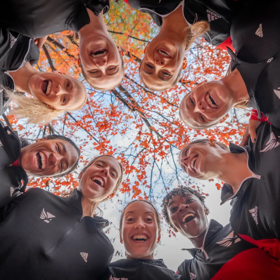 a group of people posing for the camera