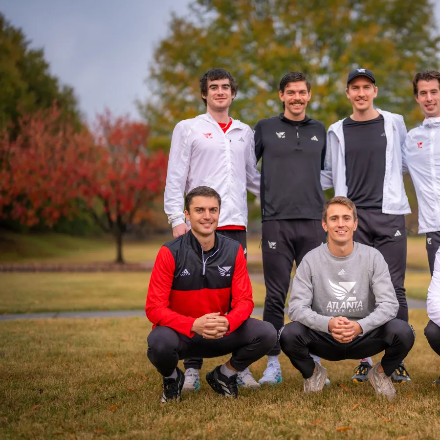 a group of men posing for a picture