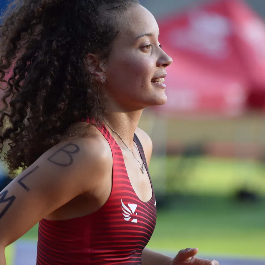 a woman running on a track