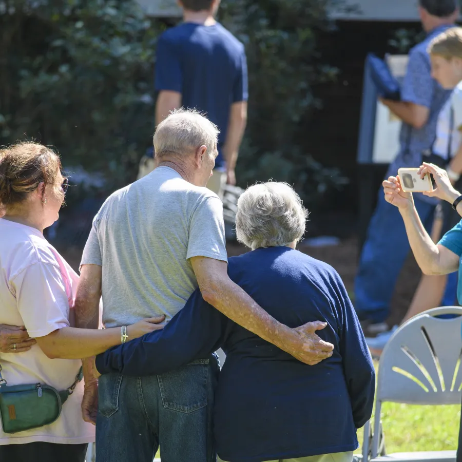 a group of people standing outside