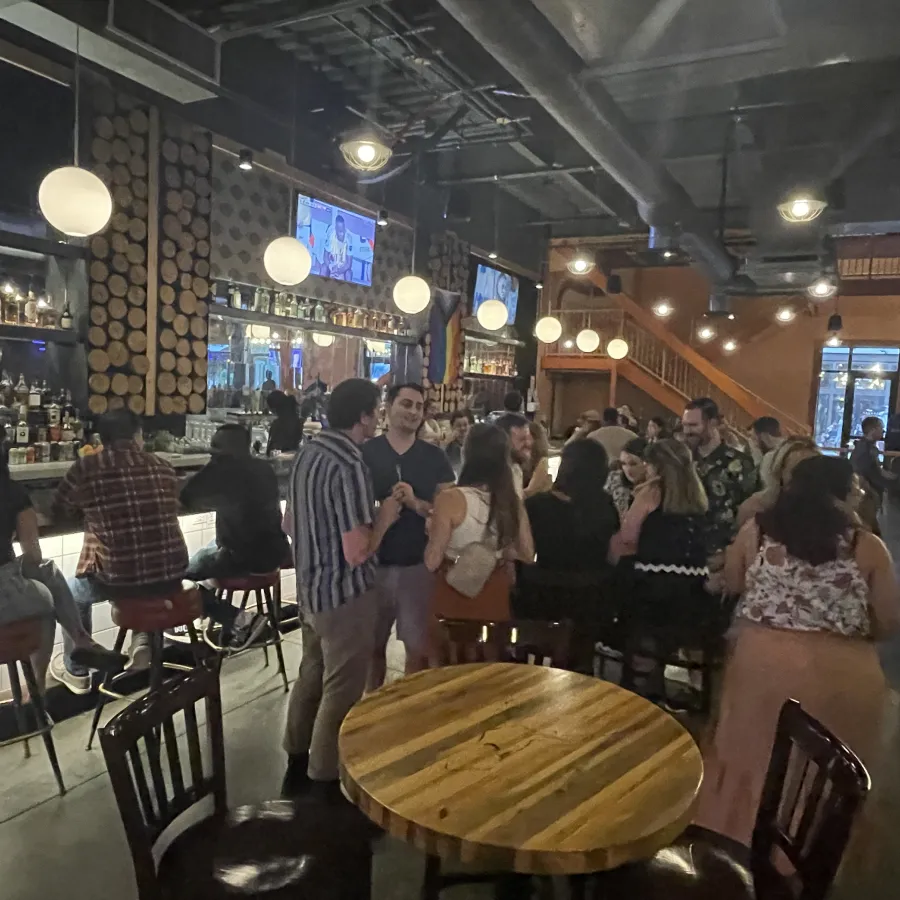 a group of people in a bar