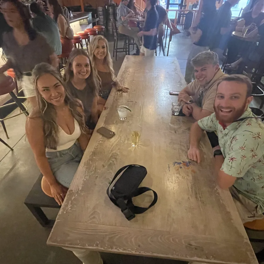 a group of children sitting at a table