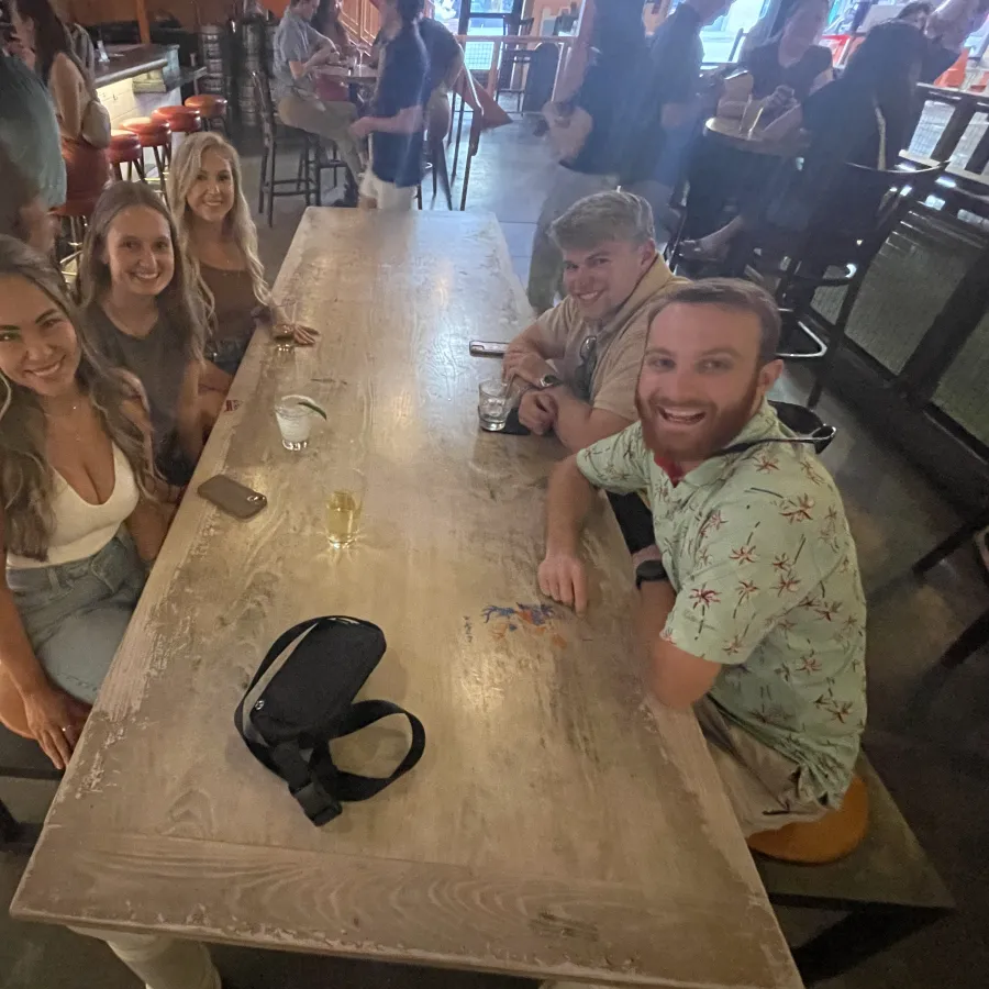 a group of children sitting at a table