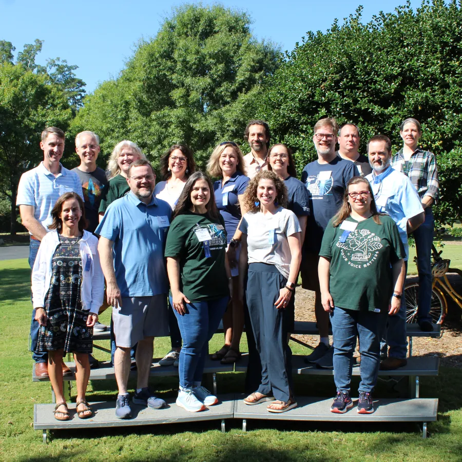 a group of people posing for a photo