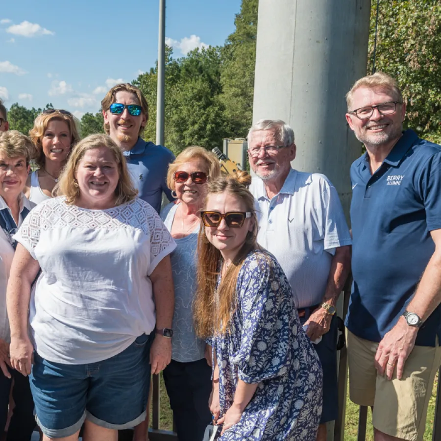 a group of people posing for a photo