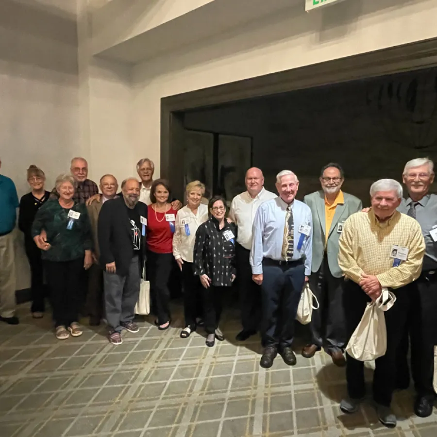 a group of people posing for a photo