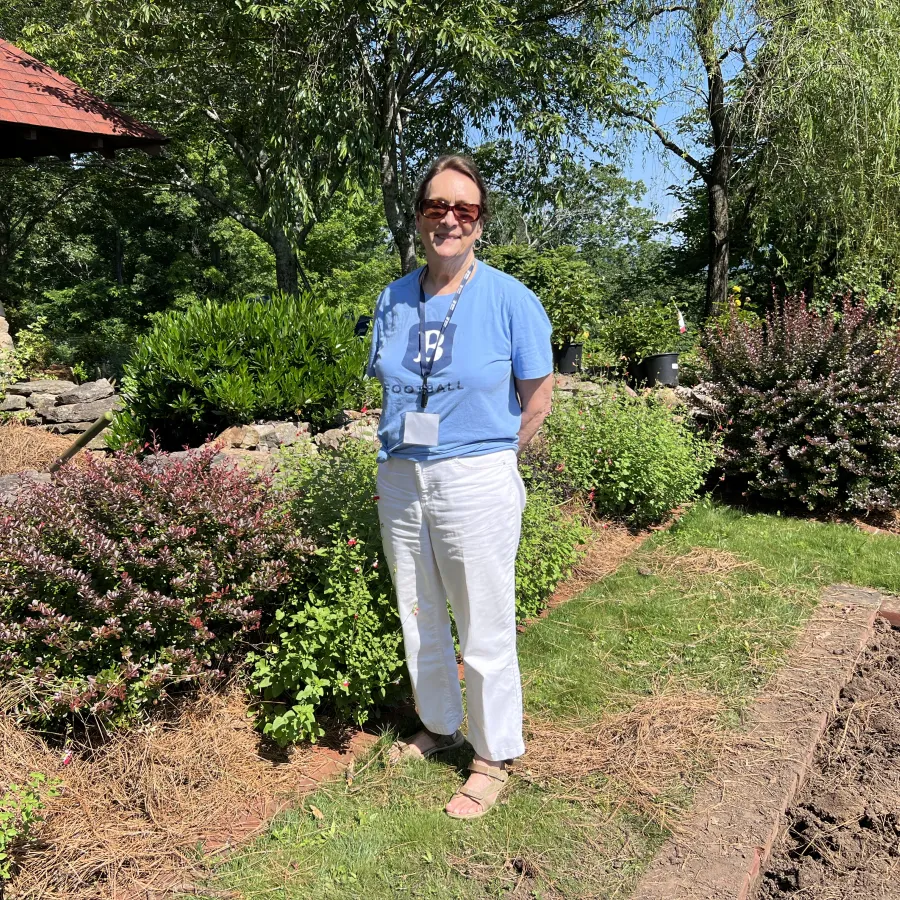 a man standing in a garden