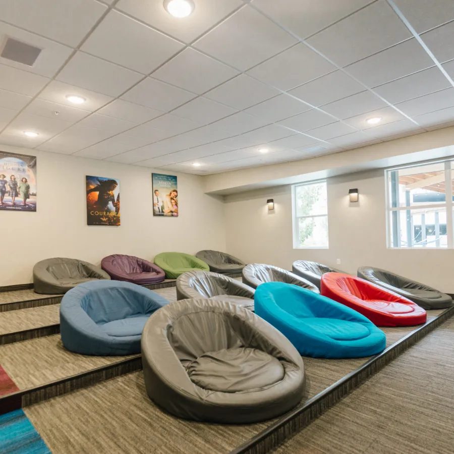 a room with a couch and a rug