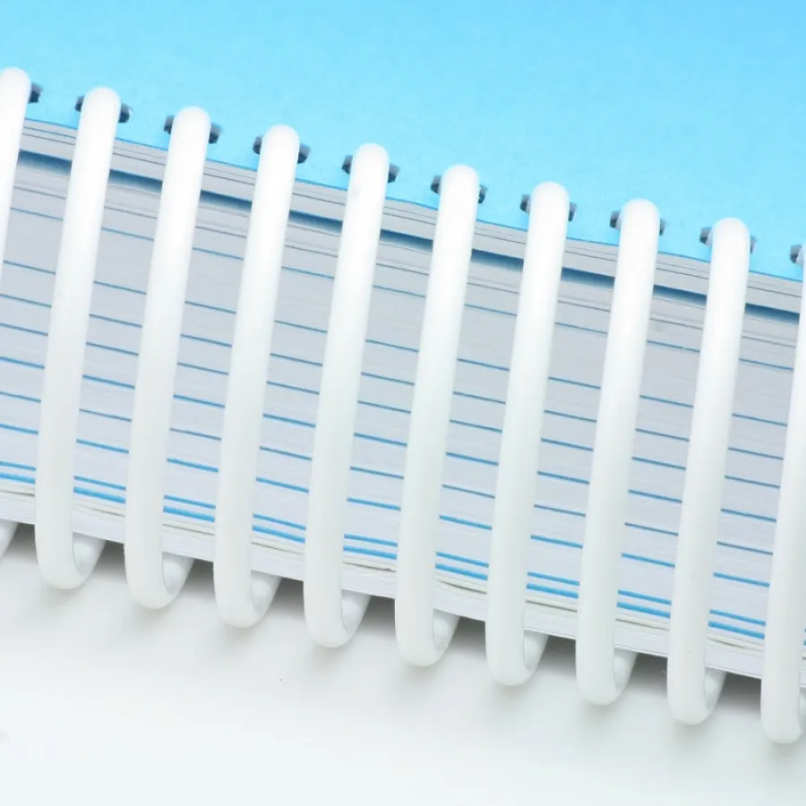 Blue book with white coil binding