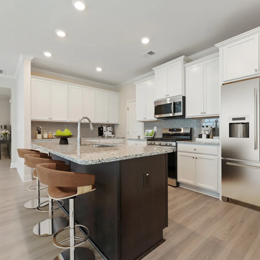 a kitchen with white cabinets