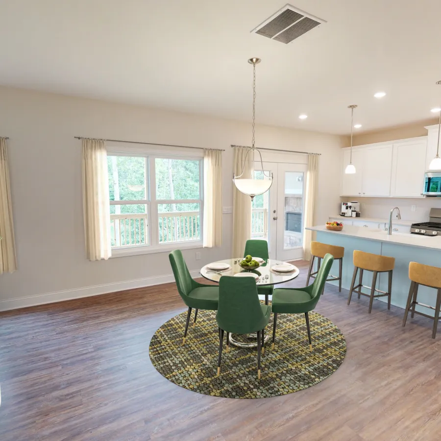 a living room filled with furniture and a large window