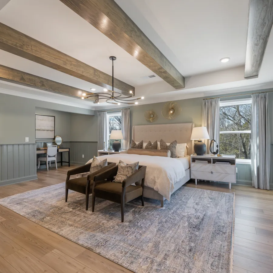 a large bedroom with a large bed