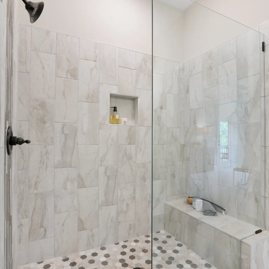 a room with a sink and a shower