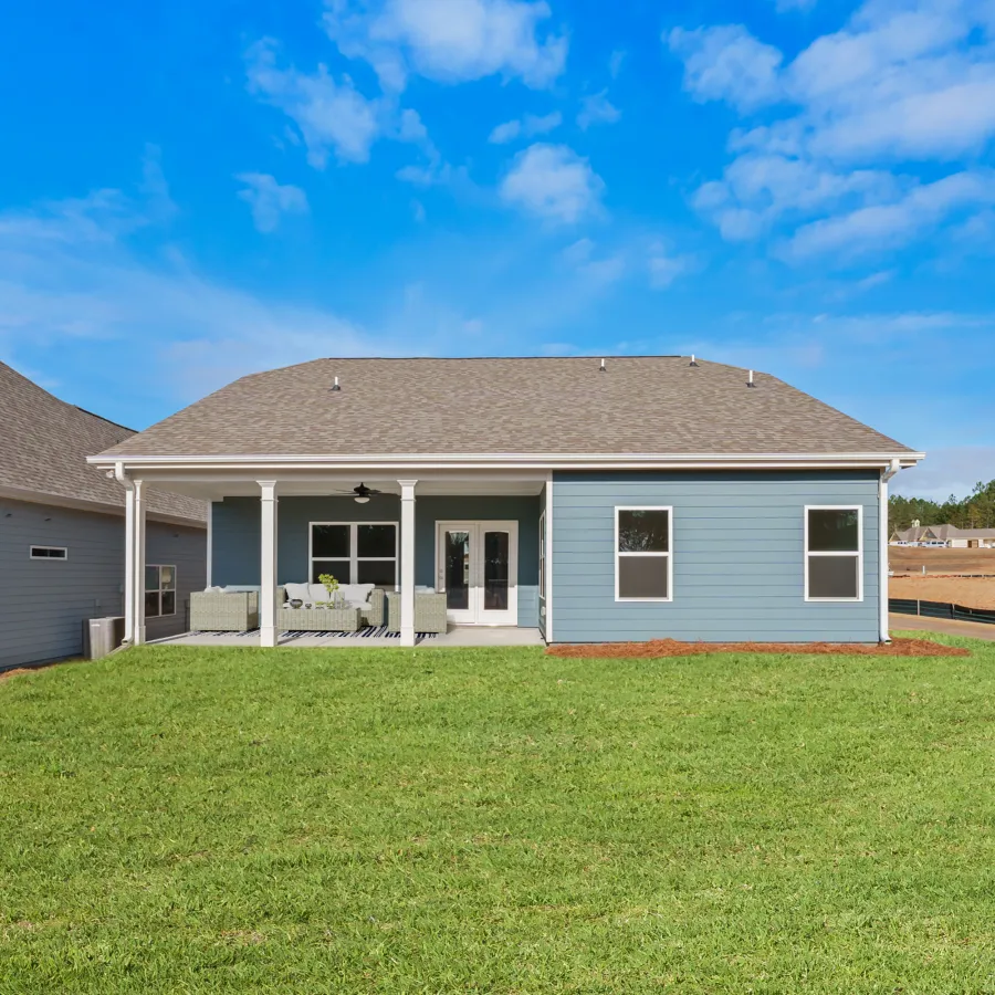 a house with a lawn in front of it