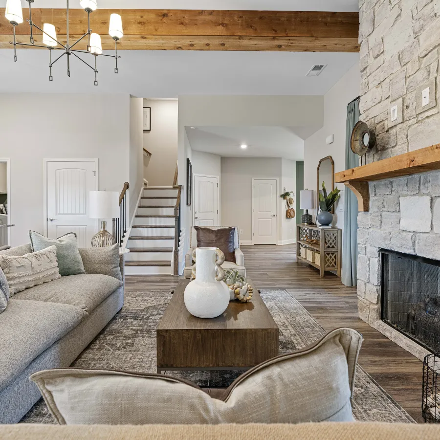 a living room with a fireplace