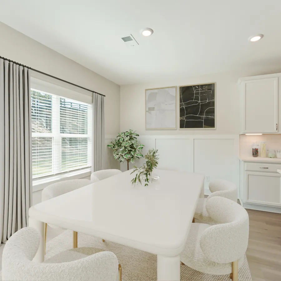 a kitchen with a dining table