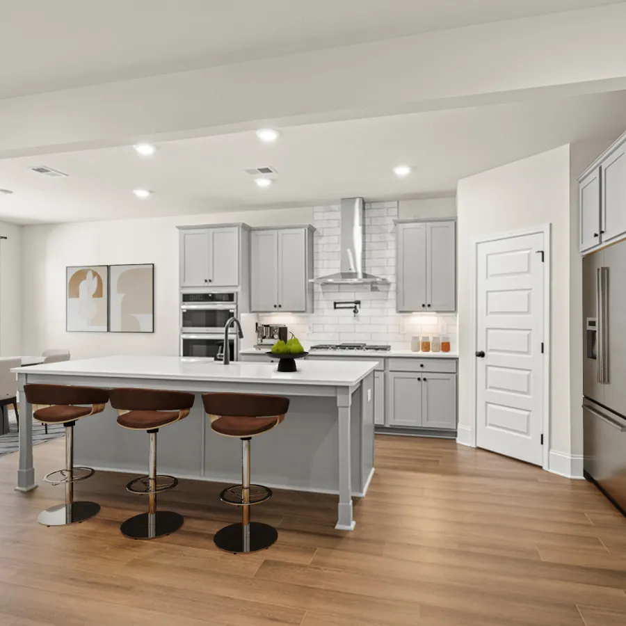 a kitchen with white cabinets