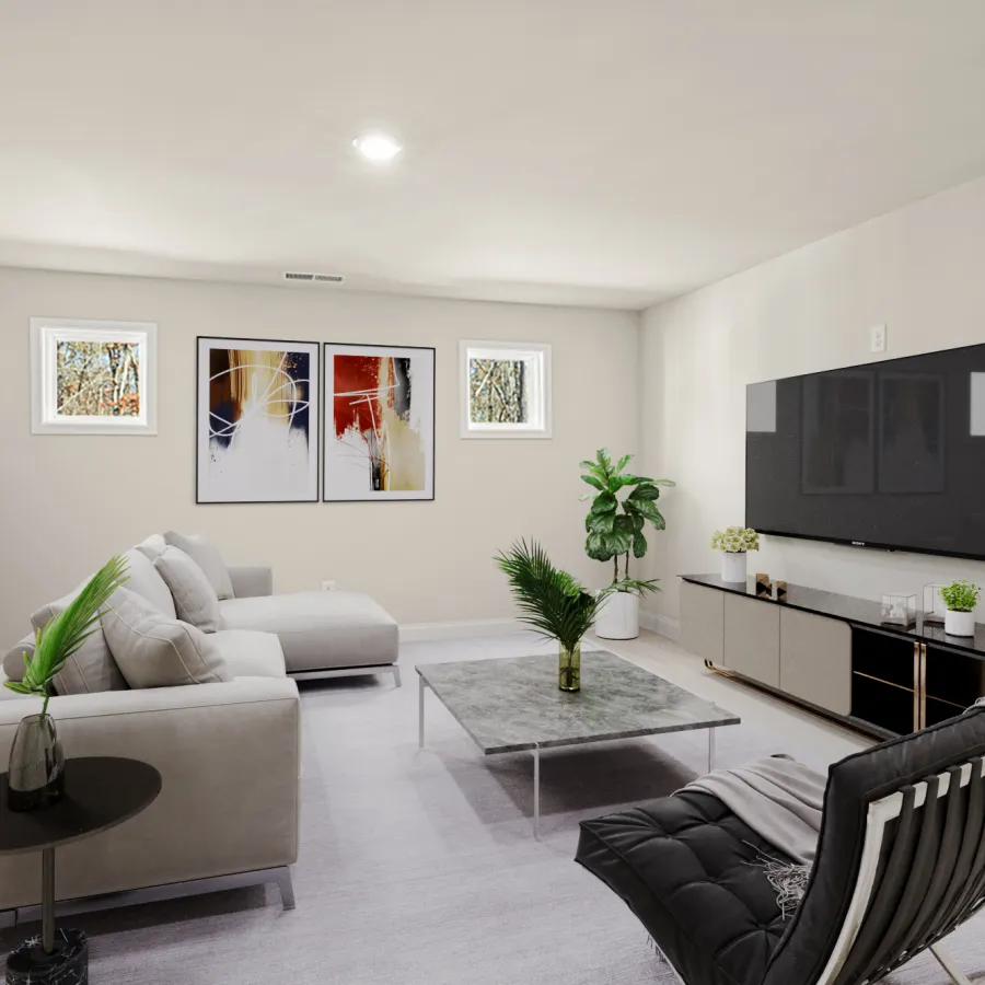 a living room with a tv and couches