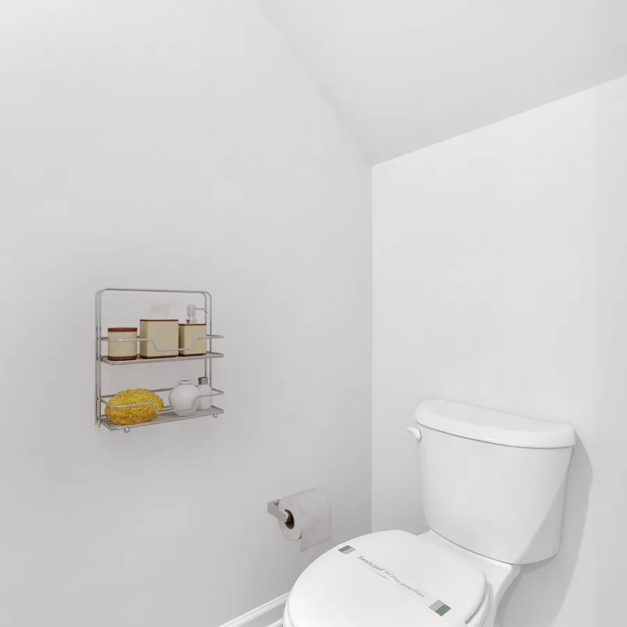 Modern bathroom featuring a white toilet, minimalist decor, and neutral tones.
