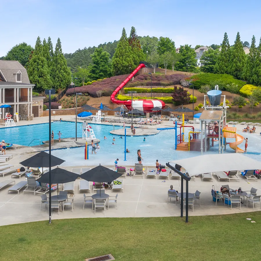 a swimming pool with people in it