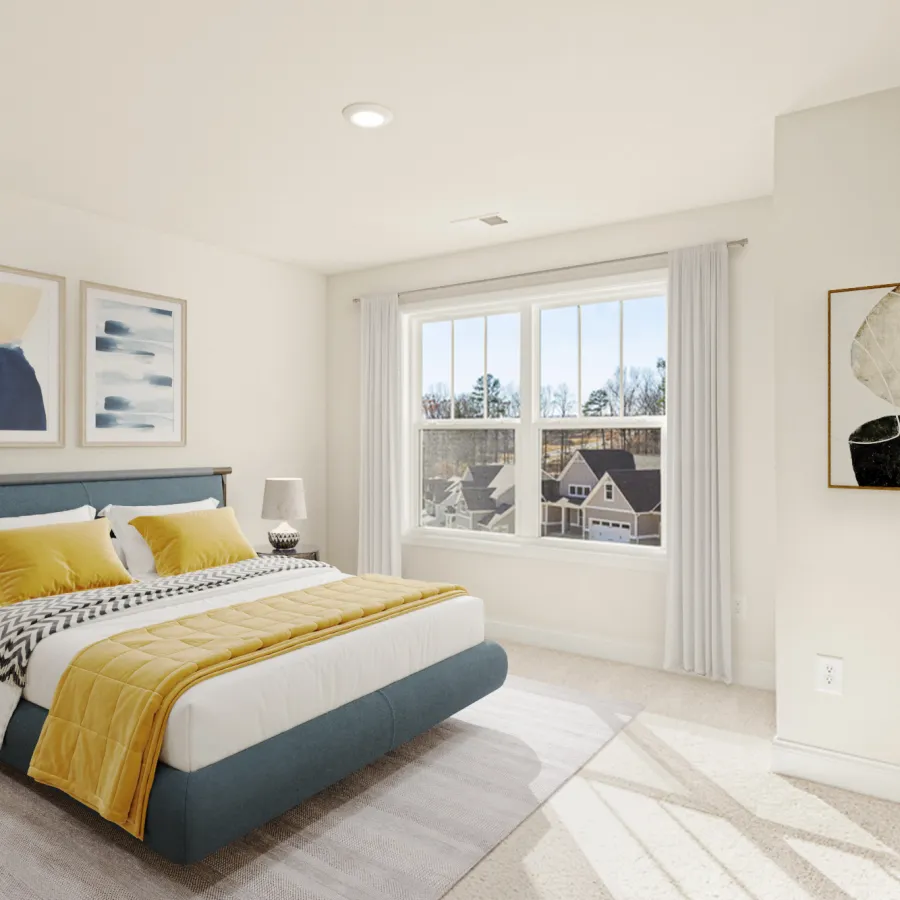 a bedroom with a large window