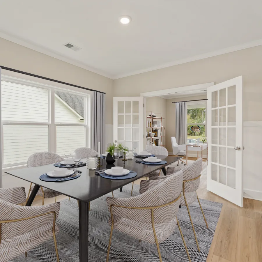 a dining room table with chairs