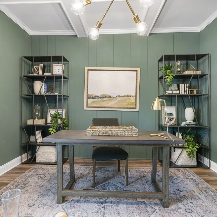 a room with a table and shelves