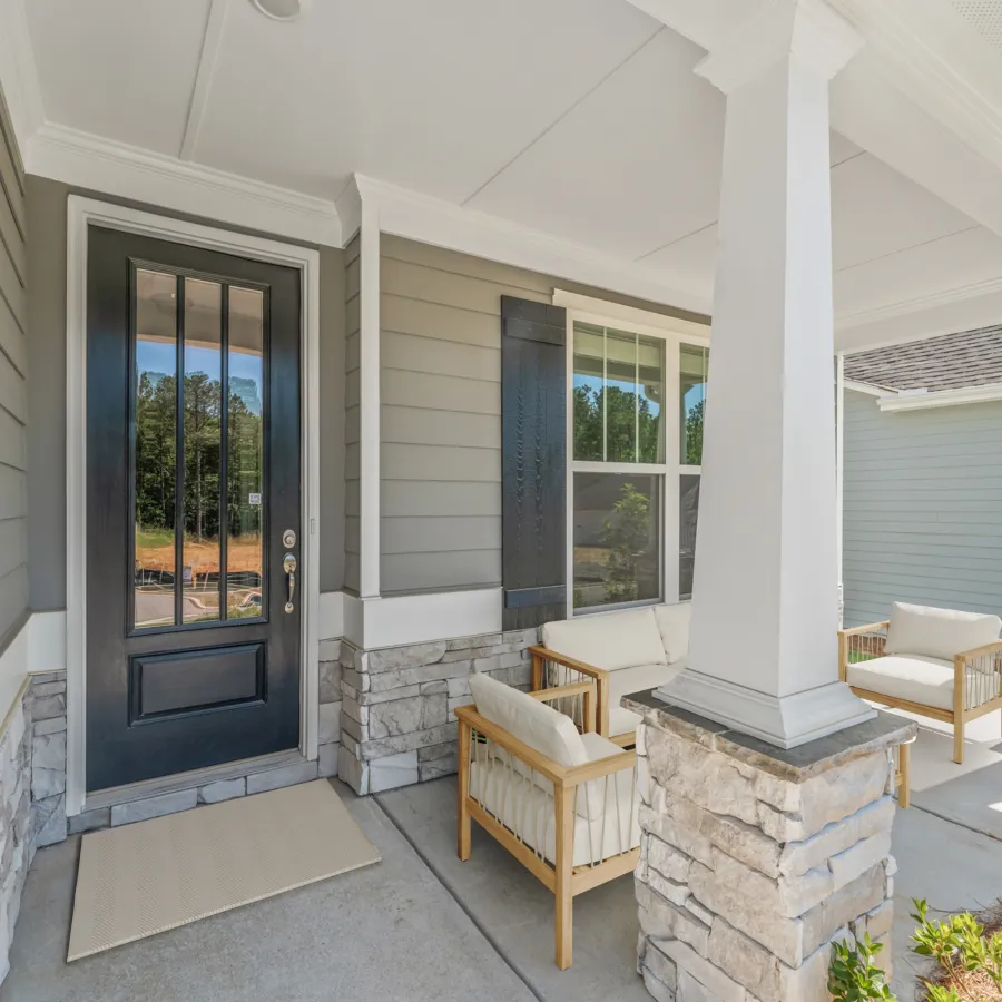 a house with a patio and a fireplace