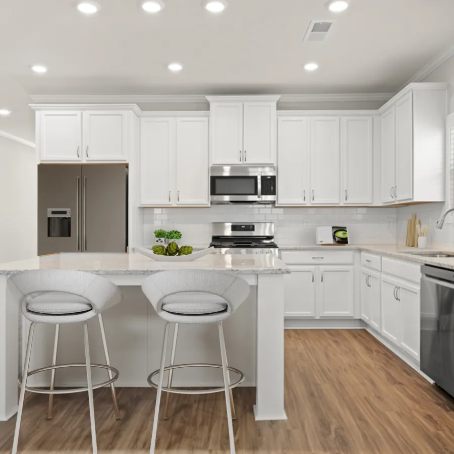 a kitchen with white cabinets